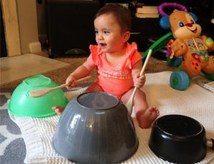 Baby playing drums