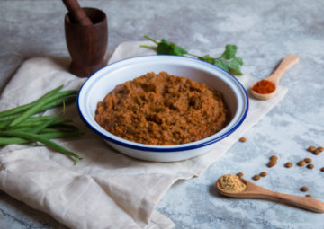 Bowl of lamb curry with lentils
