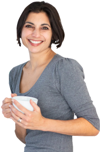 Woman holding mug smiling