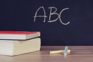 ABC written on chalkboard in school